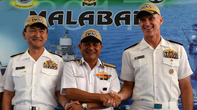Japanese Rear Admiral Hiroshi Yamamura (L), US Rear Admiral William Byrne (R) and HCS Bisht, vice admiral of the Indian Navy, pose for photographers during the inauguration of joint naval exercises with the United States and India in Chennai on July 10. (AFP Photo) Japanese Rear Admiral Hiroshi Yamamura (L), US Rear Admiral William Byrne (R) and HCS Bisht, vice admiral of the Indian Navy, pose for photographers during the inauguration of joint naval exercises with the United States and India in Chennai on July 10. (AFP Photo)