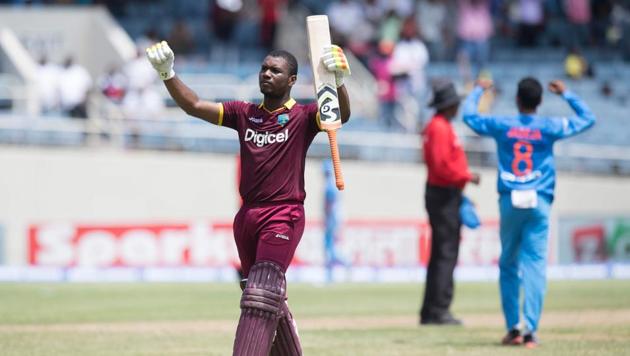 Evin Lewis celebrates his century during West Indies’ one-off T20I against India at Kingston, Jamaica.(AFP)