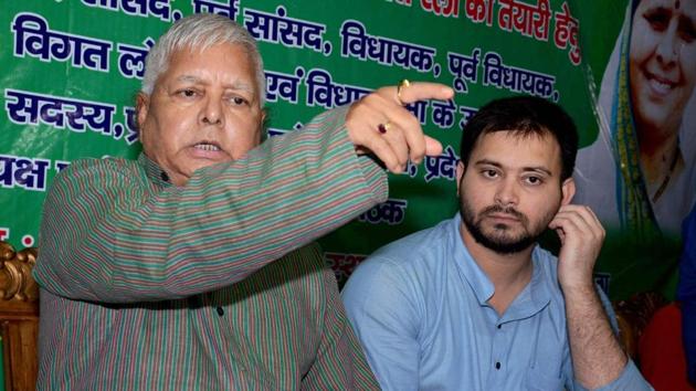 RJD chief Lalu Prasad addresses a press conference with his son and Bihar deputy CM Tejashwi Yadav at his residence in Patna.(PTI) RJD chief Lalu Prasad addresses a press conference with his son and Bihar deputy CM Tejashwi Yadav at his residence in Patna.(PTI)