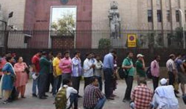 File photo of NRI’s and others waiting outside the RBI office in New Delhi to submit their demonetised banknotes on the last day of currency exchange on March 31, 2017. (Ravi Choudhary/HT PHOTO) File photo of NRI’s and others waiting outside the RBI office in New Delhi to submit their demonetised banknotes on the last day of currency exchange on March 31, 2017. (Ravi Choudhary/HT PHOTO)