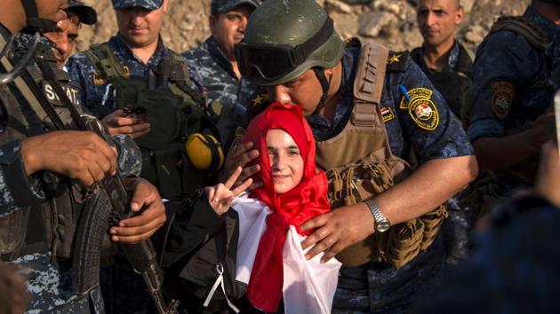 Iran has congratulated Iraq on its declared victory over the Islamic State jihadist group in Mosul and offered its help to rebuild the devastated country.(AFP Photo) Iran has congratulated Iraq on its declared victory over the Islamic State jihadist group in Mosul and offered its help to rebuild the devastated country.(AFP Photo)