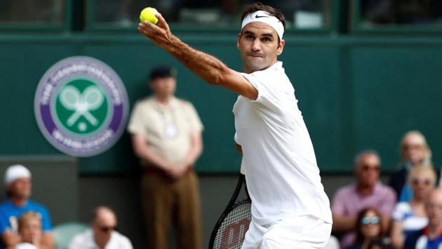 Roger Federer entered his 50th Grand Slam Q/F by beating Grigor Dimitrov 6-4, 6-2, 6-4. (REUTERS)