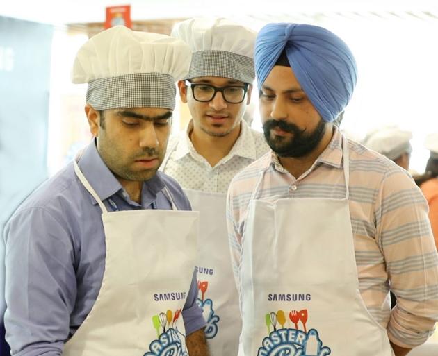 Pranjal Mehta (centre) participated in the Samsung Masterchef competition during his internship withSamsung and made spring rolls. (Sourced) Pranjal Mehta (centre) participated in the Samsung Masterchef competition during his internship withSamsung and made spring rolls. (Sourced)