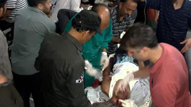 Injured being treated in a hospital after terrorists opened fire on the Amarnath Yatra in Anantnag in Jammu and Kashmir on Monday.(PTI Photo) Injured being treated in a hospital after terrorists opened fire on the Amarnath Yatra in Anantnag in Jammu and Kashmir on Monday.(PTI Photo)