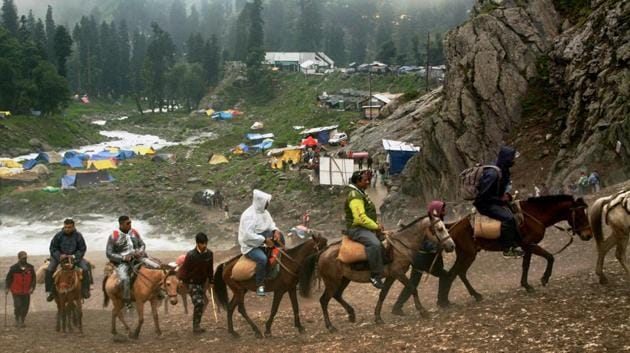 Hundreds of thousands of Hindu pilgrims trek over mountain trails to reach Amarnath caves, around 3,900 metres (12,800 feet) above sea level, in Kashmir every year (PTI)