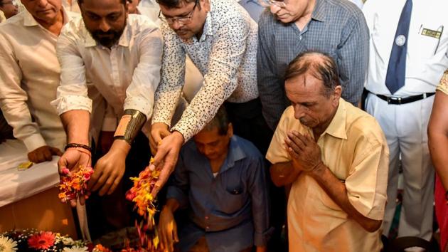 Blast victims and their families at the memorial. (Kunal Patil/HT Photo)