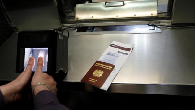 Representative Image | A man has his fingerprints electronically taken while taking part in a visa application demonstration during a media tour at the consular section of the Embassy of the United States in Lima. (Reuters) Representative Image | A man has his fingerprints electronically taken while taking part in a visa application demonstration during a media tour at the consular section of the Embassy of the United States in Lima. (Reuters)