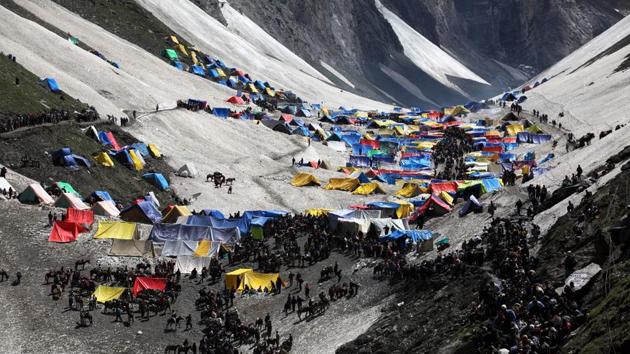 Pilgrims on a glacial campsite on the final stretch of their journey leading to the Amarnath cave shrine. Seven people were killed when terrorists attacked their bus. (AFP File Photo) Pilgrims on a glacial campsite on the final stretch of their journey leading to the Amarnath cave shrine. Seven people were killed when terrorists attacked their bus. (AFP File Photo)