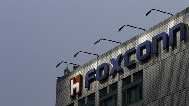 The logo of Foxconn, the trading name of Hon Hai Precision Industry, is seen on top of the company's headquarters in New Taipei City, Taiwan. Referring to the commitment by Foxconn and Midea to invest in India, the Global Times article said these investments are coming close on the heels of India’s decision to implement the Goods and Services Tax (GST). (REUTERS) The logo of Foxconn, the trading name of Hon Hai Precision Industry, is seen on top of the company's headquarters in New Taipei City, Taiwan. Referring to the commitment by Foxconn and Midea to invest in India, the Global Times article said these investments are coming close on the heels of India’s decision to implement the Goods and Services Tax (GST). (REUTERS)