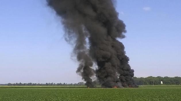 Smoke and flames rise from the wreckage after a military transport airplane crashed in a field near Itta Bena, Mississippi. (AP Photo) Smoke and flames rise from the wreckage after a military transport airplane crashed in a field near Itta Bena, Mississippi. (AP Photo)