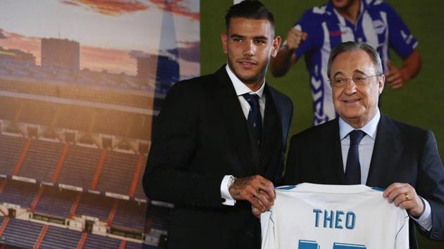 Real Madrid's president Florentino Perez poses with their new signing Theo Hernandez during his presentation at the Santiago Bernabeu in Madrid.(Reuters)