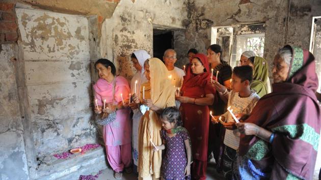 Relatives pay homage to those killed at Gulbarg Society following the February 2002 Godhra train incident, which sparked communal riots that year, on the ninth anniversary of the incident in Ahmedabad on February 28, 2011. (AFP/Getty Images File Photo) Relatives pay homage to those killed at Gulbarg Society following the February 2002 Godhra train incident, which sparked communal riots that year, on the ninth anniversary of the incident in Ahmedabad on February 28, 2011. (AFP/Getty Images File Photo)
