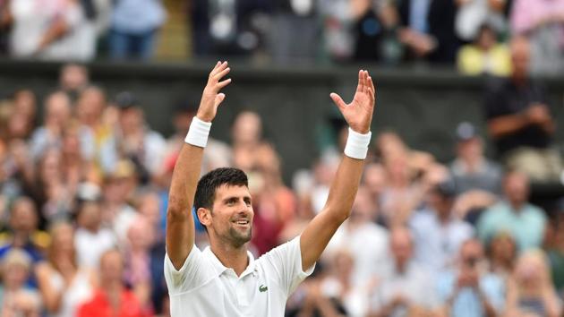 Novak Djokovic gestures to the crowd after beating Adrian Mannarino during their men's singles fourth round match of the 2017 Wimbledon Championship. (AFP) Novak Djokovic gestures to the crowd after beating Adrian Mannarino during their men's singles fourth round match of the 2017 Wimbledon Championship. (AFP)