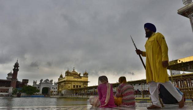 Cloudy weather at the backdrop of Golden Temple in Amritsar on Wednesday. The monsoon season in India lasts from June to September. (Gurpreet Singh/HT Photo)