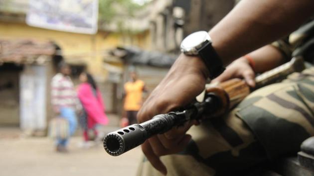 Paramilitary force personnel patrolling the area at Basirhat, West Bengal, July 8. The most alarming aspect of the recurring communal violence in the state is the absence of any punishment for the perpetrators(Samir Jana/HT PHOTO)