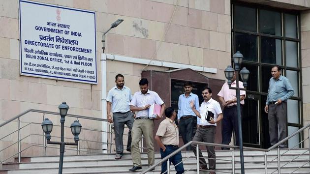 Officials at the Directorate of Enforcement office where RJD leader Misa Bharti appeared, in New Delhi on July 11. (PTI Photo) Officials at the Directorate of Enforcement office where RJD leader Misa Bharti appeared, in New Delhi on July 11. (PTI Photo)