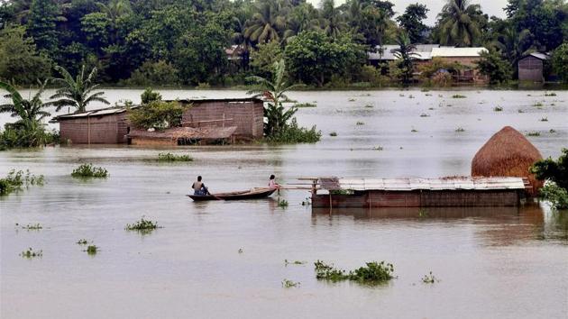 Villagers row a boat to reach to a safer place as incessant rains created a flood-like situation at Kureni Bori in Morigaon district of Assam. (PTI Photo) Villagers row a boat to reach to a safer place as incessant rains created a flood-like situation at Kureni Bori in Morigaon district of Assam. (PTI Photo)