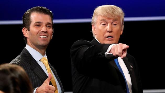 Donald Trump Jr gives a thumbs up beside his father Donald Trump during the US presidential debate in Hempstead, New York, on September 26. (REUTERS) Donald Trump Jr gives a thumbs up beside his father Donald Trump during the US presidential debate in Hempstead, New York, on September 26. (REUTERS)