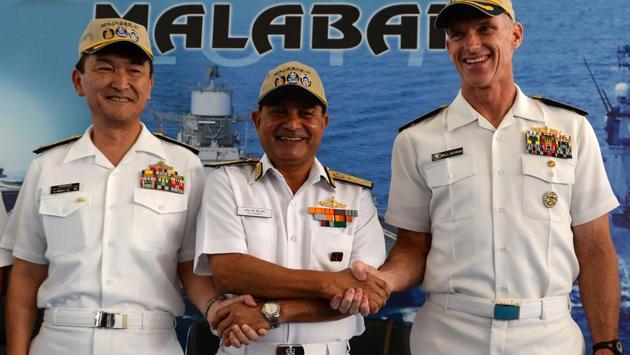 Flag Officer Commanding-in-Chief, Eastern Naval Command HCS Bisht (C), Japan Maritime Self-Defense Force Vice Admiral Hiroshi Yamamura (L), US Navy Commander Rear Admiral William D Byrne Jr (R), at the inauguration of the trilateral Malabar Exercise 2017. The at-sea leg of the exercises to be held in the Bay of Bengal is geared towards building maritime co-operation between participants and the planning and execution of tactical operations. (AFP) Flag Officer Commanding-in-Chief, Eastern Naval Command HCS Bisht (C), Japan Maritime Self-Defense Force Vice Admiral Hiroshi Yamamura (L), US Navy Commander Rear Admiral William D Byrne Jr (R), at the inauguration of the trilateral Malabar Exercise 2017. The at-sea leg of the exercises to be held in the Bay of Bengal is geared towards building maritime co-operation between participants and the planning and execution of tactical operations. (AFP)