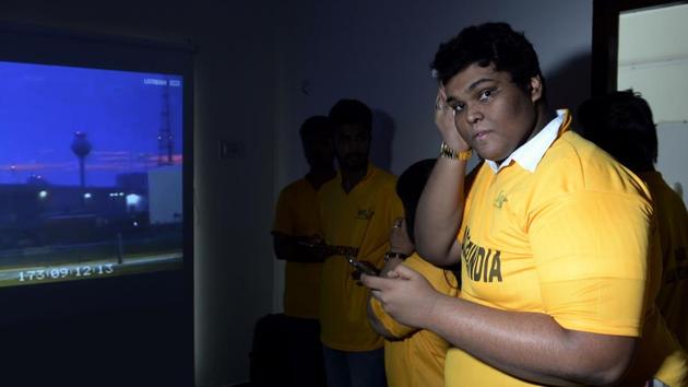 Teenager Rifath Shaarook gestures as he witnesses the launch of his satellite from Nasa's Wallops Island facility live on a screen, in Chennai on June 22.(AFP File Photo)