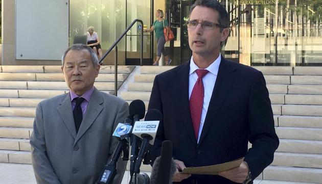 Paul Delacourt, the FBI special agent in charge of the Hawaii bureau, right, speaks at a news conference as Acting United States Attorney Elliot Enoki, left, listens outside federal court in Honolulu, Monday, July 10, 2017. (AP) Paul Delacourt, the FBI special agent in charge of the Hawaii bureau, right, speaks at a news conference as Acting United States Attorney Elliot Enoki, left, listens outside federal court in Honolulu, Monday, July 10, 2017. (AP)