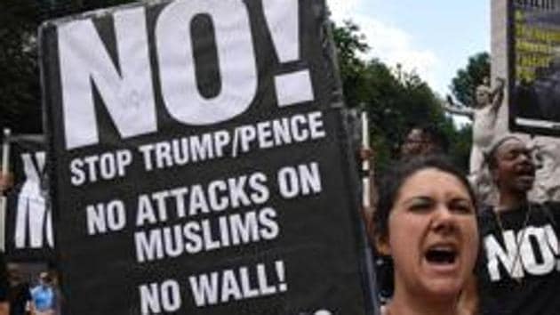 Protests march against the Supreme Court's reinstatement of large parts of President Trump’s travel ban. (AFP File Photo) Protests march against the Supreme Court's reinstatement of large parts of President Trump’s travel ban. (AFP File Photo)