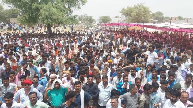 Members from the Rajput community at a gathering on Wednesday in Saanvrad, the native village of gangster Anandpal Singh. (HT Photo)