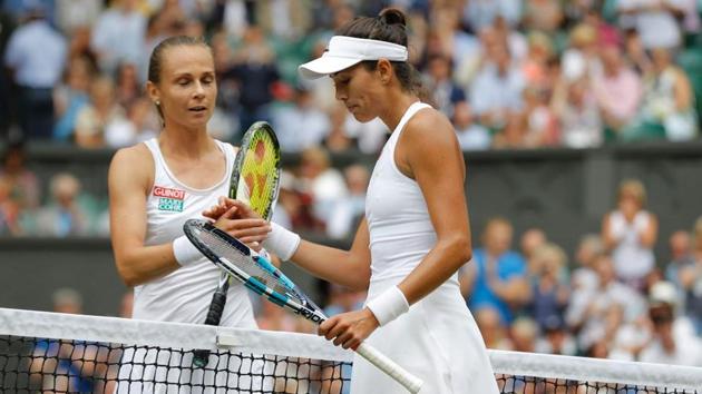 Muguruza stormed into her second Wimbledon final in three years with a 6-1, 6-1 demolition of nerve-ridden Magdalena Rybarikova in just 64 minutes on Thursday. (Reuters )
