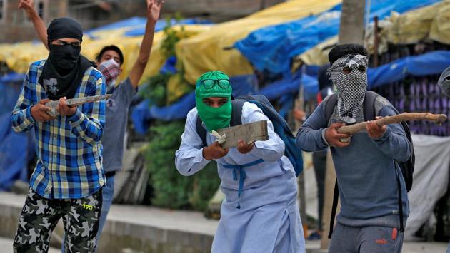 A shift in the patterns of violence in Kashmir has been witnessed in the past one year. After the death of Hizbul militant Burhaan Wani, Kashmir valley plunged into crisis. At least 90 people were killed and 1,000 wounded during the ensuing unrest with security forces taking to pellet guns for crowd control. Thousands of police personnel and security forces dotted the roads and villages of the valley to prevent the aftermath. Young boys first took to throwing stones in mass protests during the 2008 uprising. Since then, it has become a popular way for youths to express their anger against the government and authorities in the valley. (Cathal McNaughton / REUTERS)