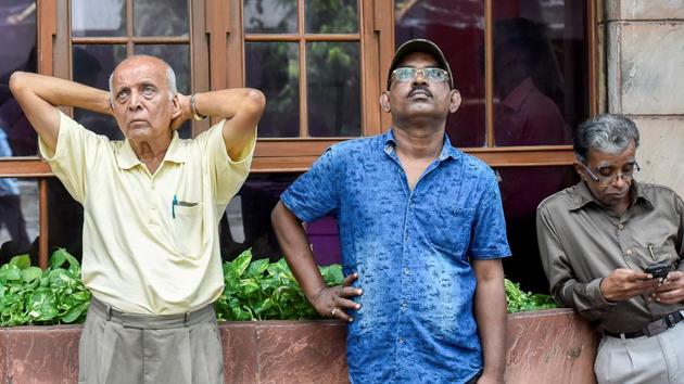 Three men, three moods. (Kunal Patil/HT Photo) 