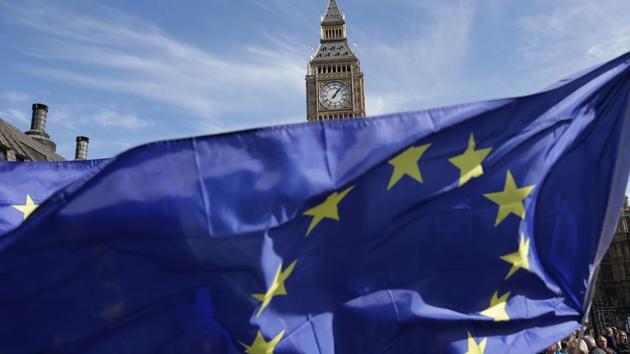 Demonstrators hold EU flags as they enter Parliament Square and pass the Houses of Parliament during an anti-Brexit, pro-European Union (EU) march in central London on March 25. (AFP File Photo) Demonstrators hold EU flags as they enter Parliament Square and pass the Houses of Parliament during an anti-Brexit, pro-European Union (EU) march in central London on March 25. (AFP File Photo)