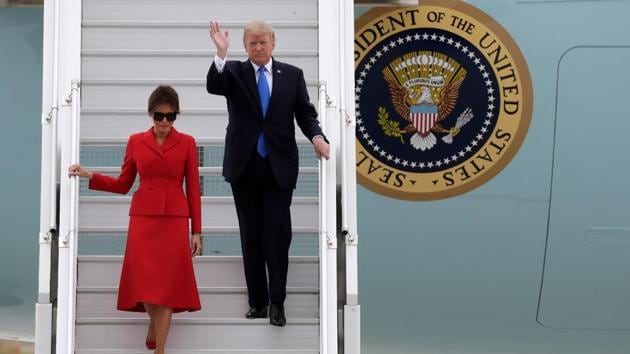 US President Donald Trump waves as he disembarks form Air Force One with First Lady Melania at Paris' Orly airport. (AFP Photo) US President Donald Trump waves as he disembarks form Air Force One with First Lady Melania at Paris' Orly airport. (AFP Photo)