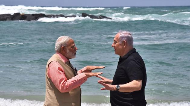 Prime Minister Narendra Modi (L) and Isreali Prime Minister Benjamin Netanyahu on the Olga Beach in Hadera, Israel. (AFP File) Prime Minister Narendra Modi (L) and Isreali Prime Minister Benjamin Netanyahu on the Olga Beach in Hadera, Israel. (AFP File)