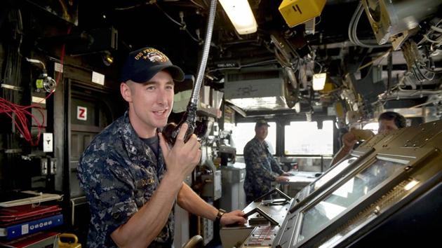 A US sailor engaged in a discussion on board the USS Princeton in Chennai.Traditionally a bilateral exercise between the US and India since 1994, Japan had been participant in the past along with Singapore and Australia but was elevated to a permanent member position in January 2015. (R Senthil Kumar / PTI) A US sailor engaged in a discussion on board the USS Princeton in Chennai.Traditionally a bilateral exercise between the US and India since 1994, Japan had been participant in the past along with Singapore and Australia but was elevated to a permanent member position in January 2015. (R Senthil Kumar / PTI)