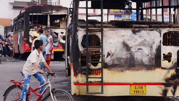In 2015, nearly five lakh Patidar youth went on a rampage in Ahmedabad demanding reservations. Hundreds of agitators were arrested, including the 22-year-old leader of the movement, Hardik Patel. (PTI File Photo) In 2015, nearly five lakh Patidar youth went on a rampage in Ahmedabad demanding reservations. Hundreds of agitators were arrested, including the 22-year-old leader of the movement, Hardik Patel. (PTI File Photo)