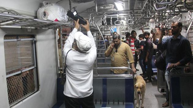 Personnel conduct check in a train. (Bhushan Koyande/HT PHOTO) 