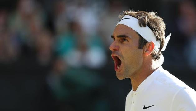 Switzerland's Roger Federer celebrates beating Canada's Milos Raonic during their men's singles quarter-final at Wimbledon 2017. (AFP) Switzerland's Roger Federer celebrates beating Canada's Milos Raonic during their men's singles quarter-final at Wimbledon 2017. (AFP)