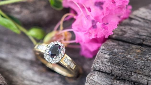 The dark hues of the Blue Sapphire make the engagement ring more appealing. (Shutterstock) The dark hues of the Blue Sapphire make the engagement ring more appealing. (Shutterstock)