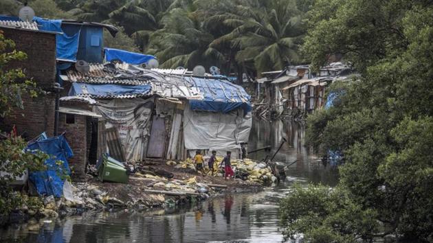 Activists allege mangroves are destroyed regularly to build shanties along the Charkop creek. Activists allege mangroves are destroyed regularly to build shanties along the Charkop creek.