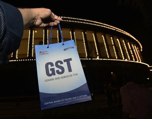The GST is meant to boost growth and scrap local taxes that add to overhead costs and stymie businesses. (HT Photo) The GST is meant to boost growth and scrap local taxes that add to overhead costs and stymie businesses. (HT Photo)
