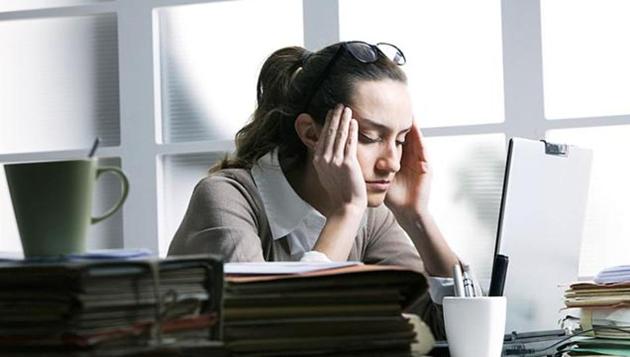 People who work 55 hours or more are approximately 40% more likely to develop atrial fibrillation. (Shutterstock) People who work 55 hours or more are approximately 40% more likely to develop atrial fibrillation. (Shutterstock)