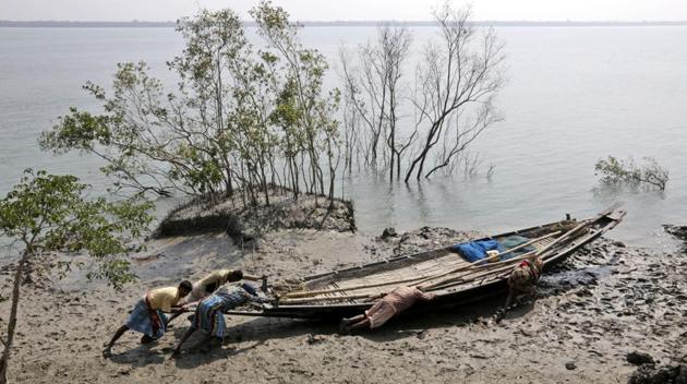These and other growing hardships could further drive migration of people along routes such as the Pacific Islands to Australia and Bangladesh to India. (AP)