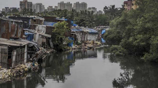 A mangrove cell official said the accused were trying to rebuild shanties at Sai Dham Nagar and sell them. (Satish Bate/HT) A mangrove cell official said the accused were trying to rebuild shanties at Sai Dham Nagar and sell them. (Satish Bate/HT)