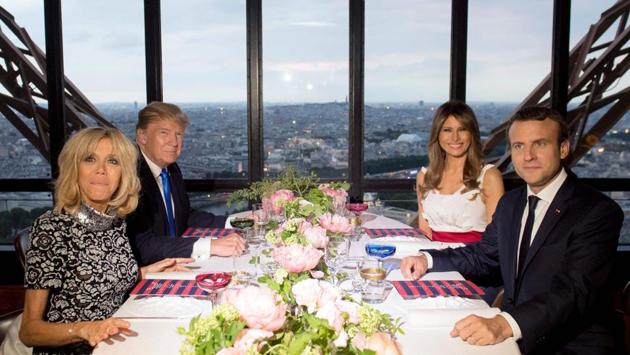 The Macrons also departed from protocol, hosting the Trumps at the Michelin starred JuIes Verne restaurant on the second floor of the Eiffel Tower instead of the customary dinner at the Élysée Palace. Trump had remarked after a string of attacks on the ‘City of Lights’ that ‘Paris is no longer Paris’. (Saul Loeb / AFP) The Macrons also departed from protocol, hosting the Trumps at the Michelin starred JuIes Verne restaurant on the second floor of the Eiffel Tower instead of the customary dinner at the Élysée Palace. Trump had remarked after a string of attacks on the ‘City of Lights’ that ‘Paris is no longer Paris’. (Saul Loeb / AFP)
