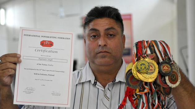 Bhupinder Singh with his medals and certificates in Ludhiana on Thursday. (Gurminder Singh/HT Photo) Bhupinder Singh with his medals and certificates in Ludhiana on Thursday. (Gurminder Singh/HT Photo)