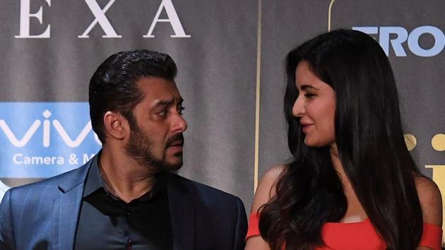 Bollywood actor Salman Khan talks to Katrina Kaif. (AFP)