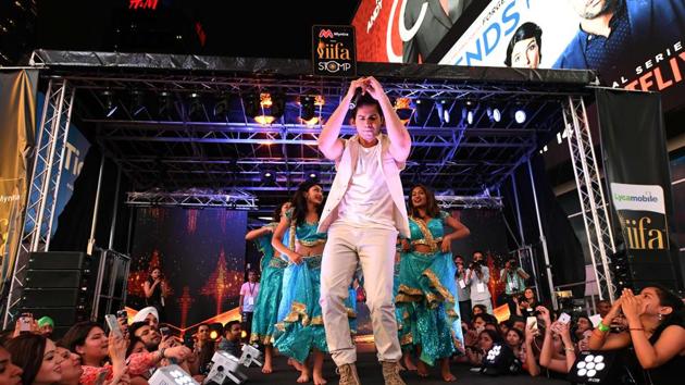 Varun Dhawan performs on stage during the IIFA Stomp in Times Square on July 13 to kick off the 18th International Indian Film Academy (IIFA) Festival in New York. (AFP)