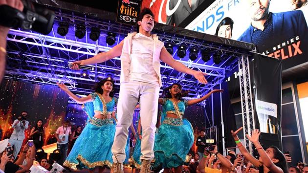 Varun Dhawan performs on stage during the IIFA Stomp in Times Square. (AFP)