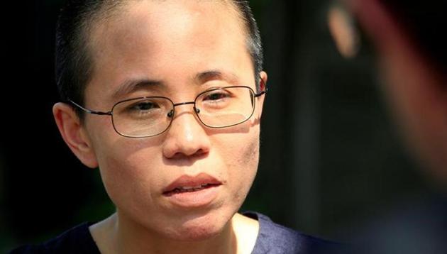 Liu Xia, wife of Chinese pro-democracy activist Liu Xiaobo, listens to a question during an interview in Beijing. (Reuters File Photo) Liu Xia, wife of Chinese pro-democracy activist Liu Xiaobo, listens to a question during an interview in Beijing. (Reuters File Photo)