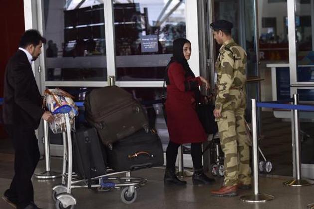 A CISF security personnel check a passenger’s documents at the IGI Airport in New Delhi.(HT File Photo) A CISF security personnel check a passenger’s documents at the IGI Airport in New Delhi.(HT File Photo)